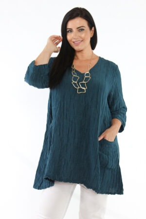 OUr model is wearing Silk linen pocket tunic V neck in Indigo by Grizas for Froxx Clothing plus sizes